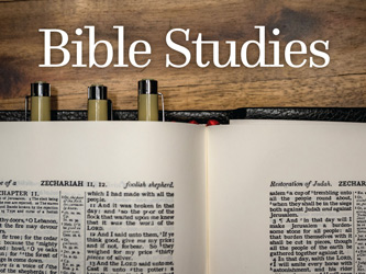 Bible Clip-Art photograph of open Bible with pens and Bible Studies caption