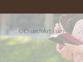 Woman holding Bible and eyeglasses and reading as background photo