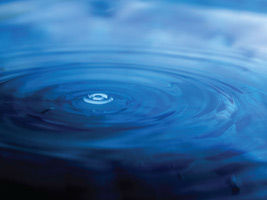Worship Background with a ripple in blue water